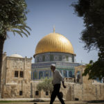 Man walking across Dome of the Rock on the Temple Mount. Credit: Zack Wajsgras/Flash90