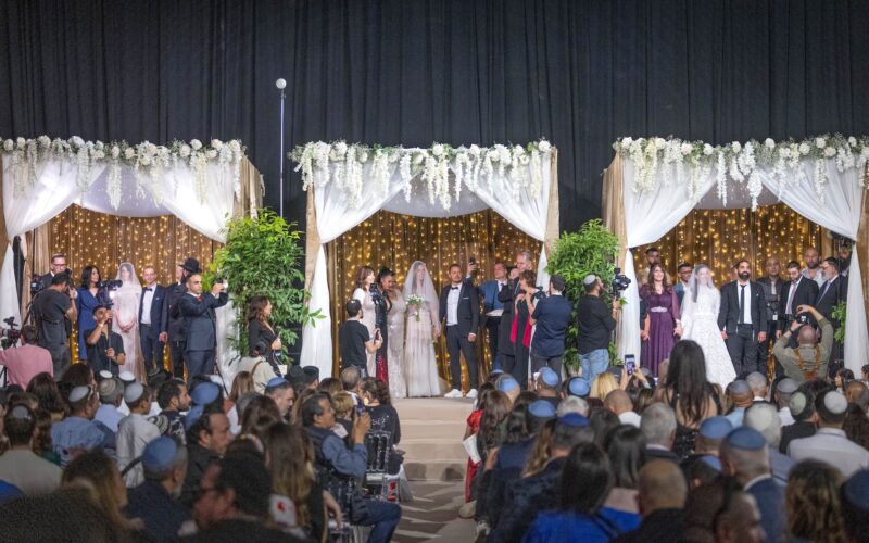 Ten Israeli couples take part in a mass wedding ceremony