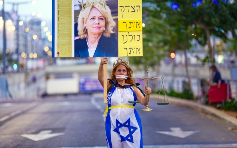 Demonstrators protest against the Israeli government