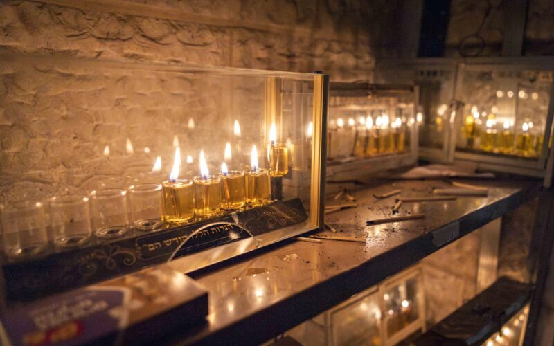 Ultra-Orthodox Jews light a hanukkiah in Jerusalem